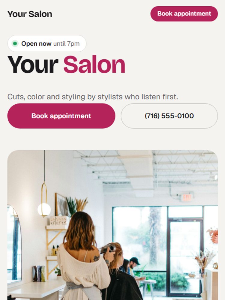 Sample salon website design shown on a phone
